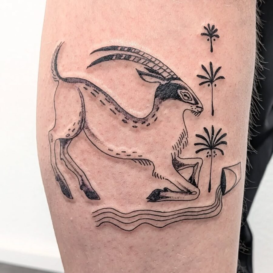 Stylized goat tattoo inspired by ancient art Tattoo on skin