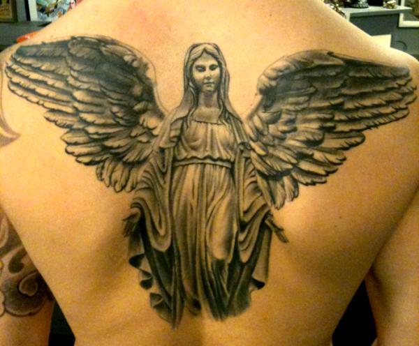 An Exquisitely Detailed Guardian Angel Tattoo Tattoo on skin