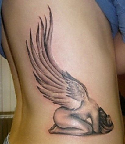Beautiful Crouching Angel Tattoos Tattoo on skin