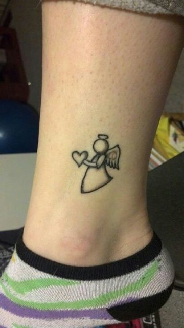 Cute And Simple Angel Tattoos in Logo Style On Ankle Tattoo on skin