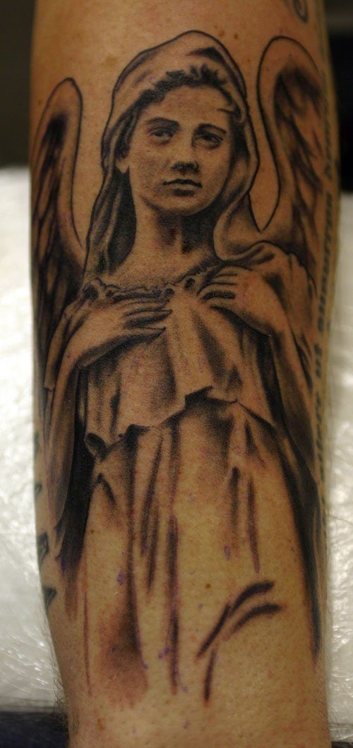 Impressive Virgin Mary Guardian Angel Tattoo Design On Forearm for Men Tattoo on skin