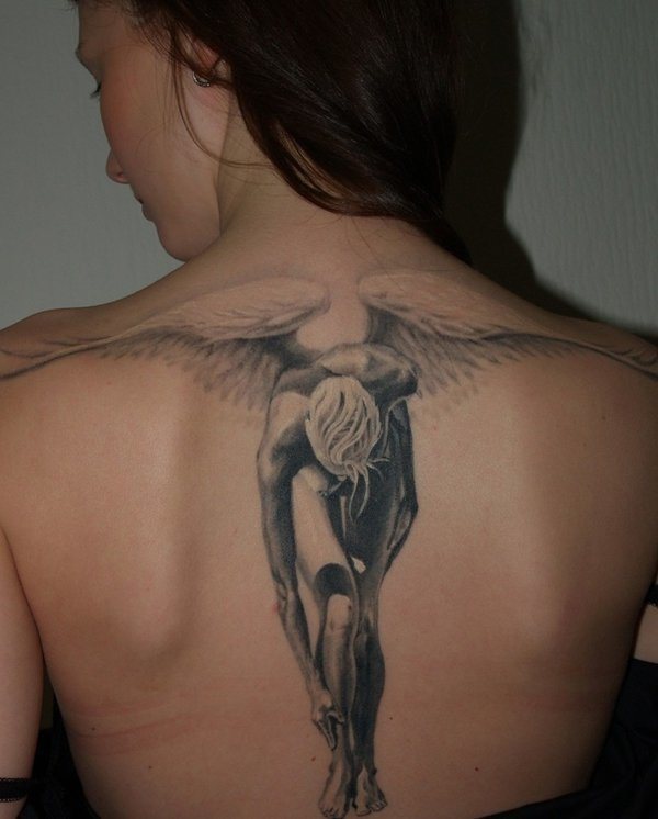 Incredible Detail In Crouching Angel Back Tattoo Tattoo on skin