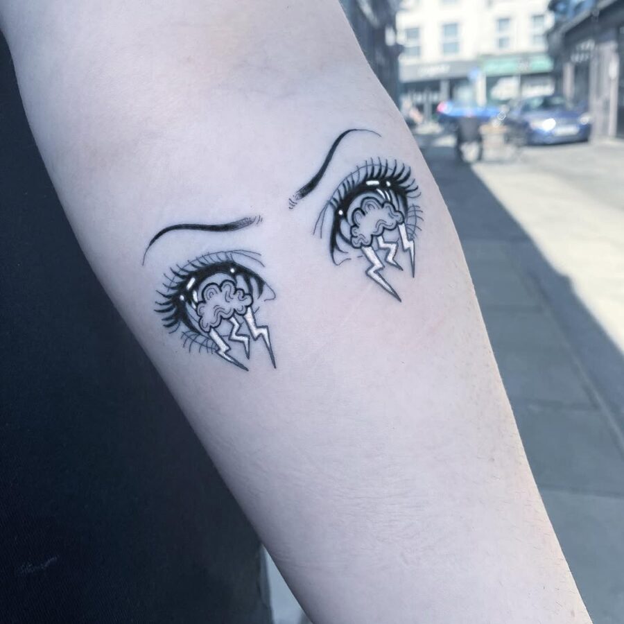 Emotive Anime Eyes with Lightning Details Tattoo on skin