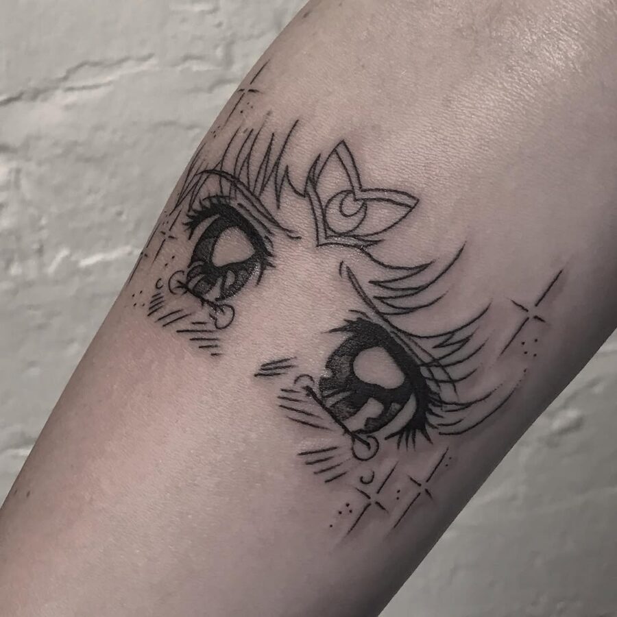 Intricate anime eyes tattoo with crystal details Tattoo on skin