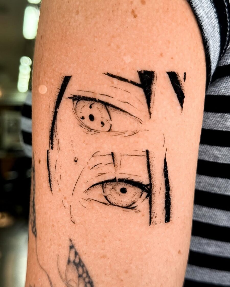 Striking anime eyes tattoo with emotional depth Tattoo on skin