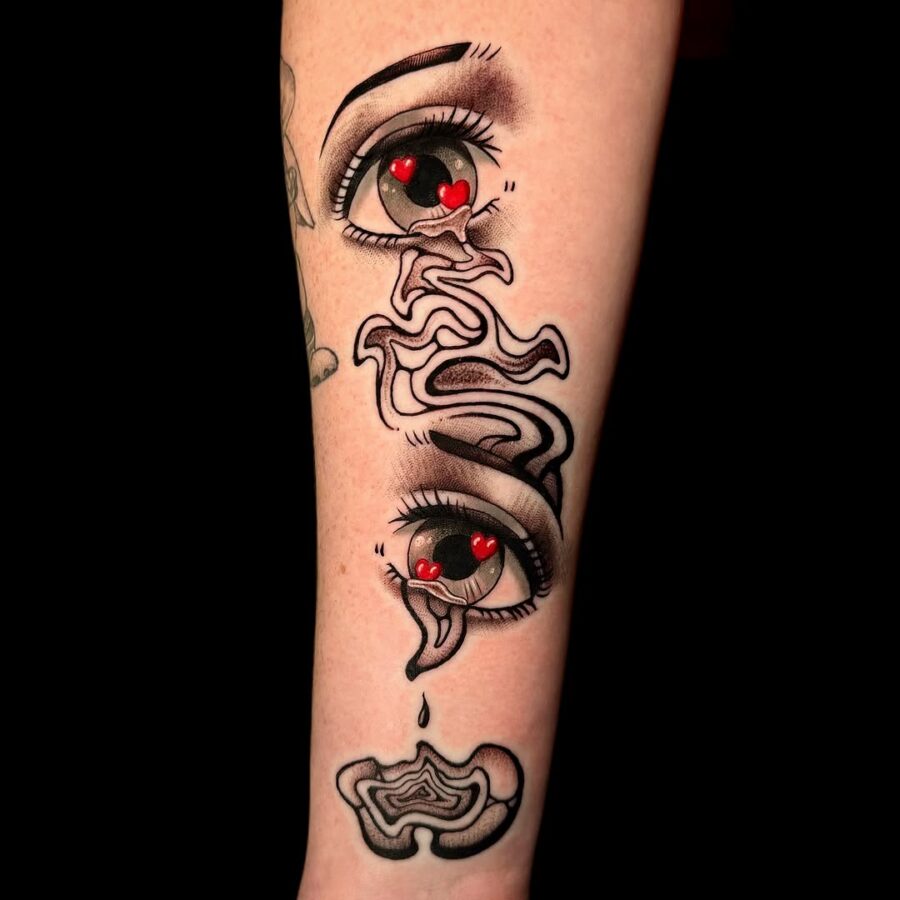 Unique anime eyes tattoo with heart details Tattoo on skin