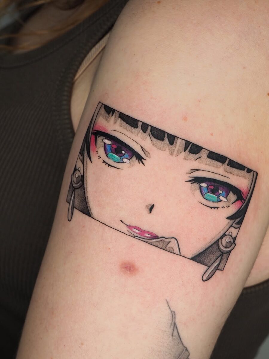 Vibrant anime eyes tattoo with captivating detail Tattoo on skin