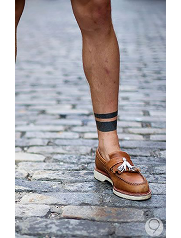 Bold Black Bands Circling ankle tattoos for Various Skin Tones Tattoo on skin