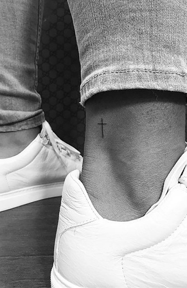 Tiny Cross on the Back of the Ankle Tattoos by tattoo shop Tattoo on skin