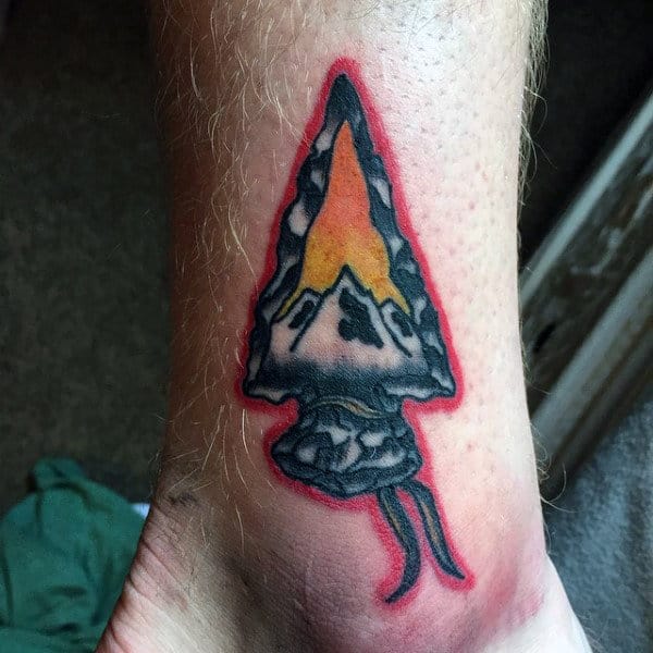 Arrowhead with Mountains at Sunset Tattoo on skin