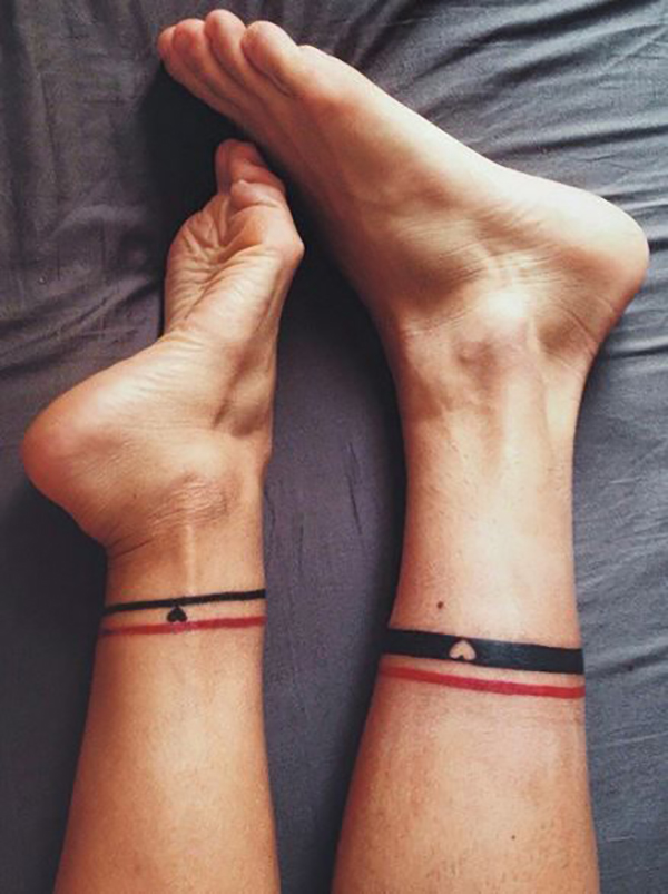 Matching Black and Red Lines ankle tattoo designs for Various Skin Tones Tattoo on skin