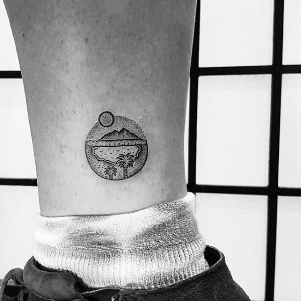 Tiny Oasis Scene in a Circle ankle tattoos Tattoo on skin