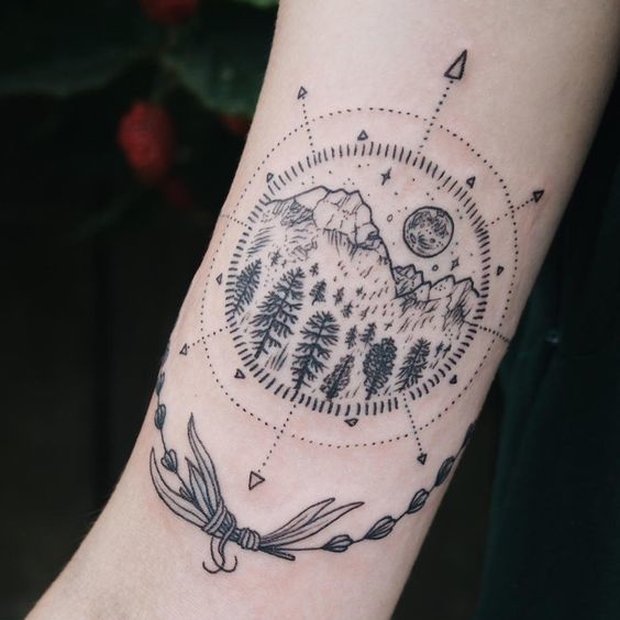 ARM TATTOO FOR THE WANDERER AT HEART Tattoo on skin