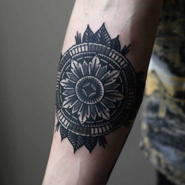 Concentric Circles & Leaves Arm Tattoo Ideas arm tattoos