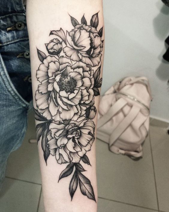 FLORAL DESIGN ON Arm Tattoo Tattoo on skin