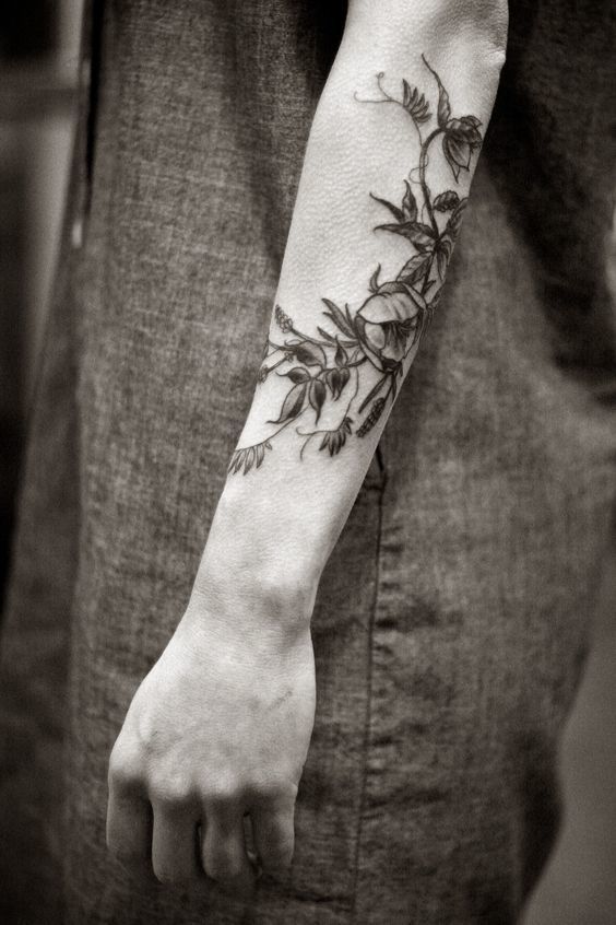 WONDERFUL FLORAL ARM TATTOO Tattoo on skin