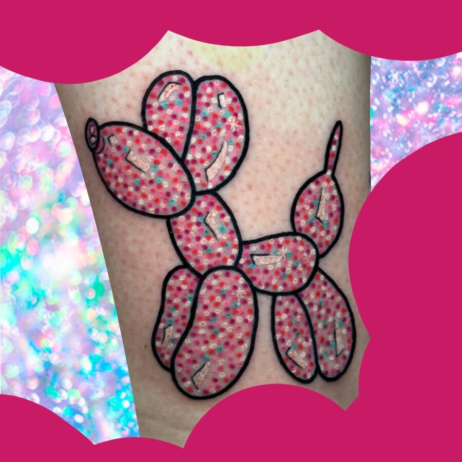 Bold and playful pink balloon dog tattoo design Tattoo on skin