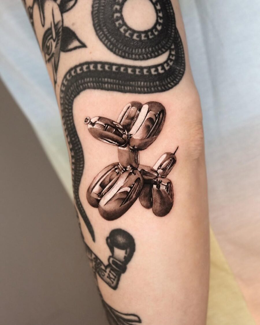 Realistic balloon dog tattoo on display Tattoo on skin