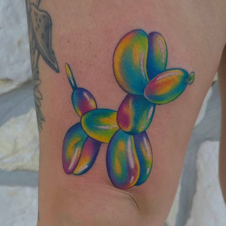 Vibrant and Playful Balloon Dog Tattoo Design Tattoo on skin