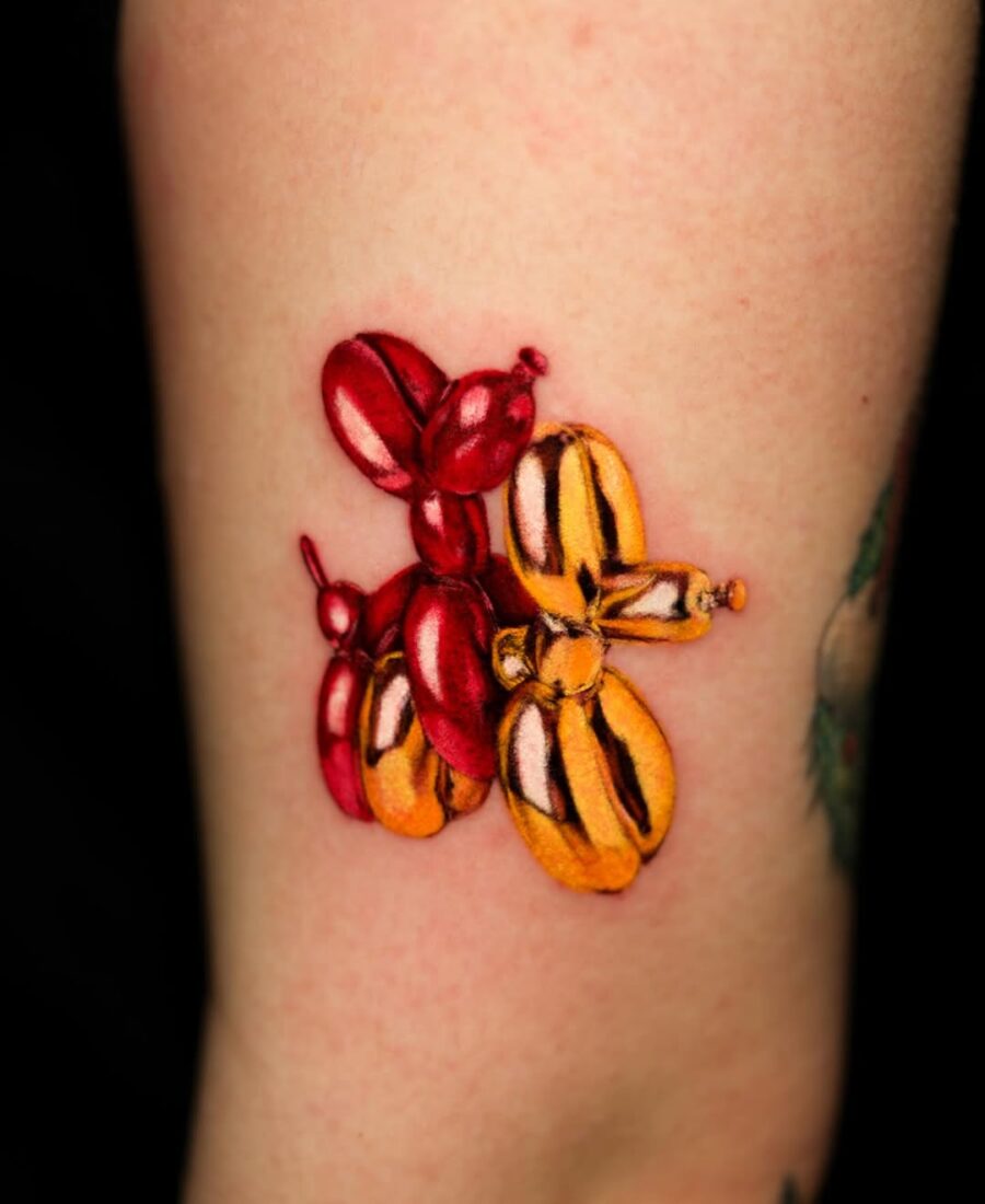 Vibrant Balloon Dog Tattoo in Bold Colors Tattoo on skin