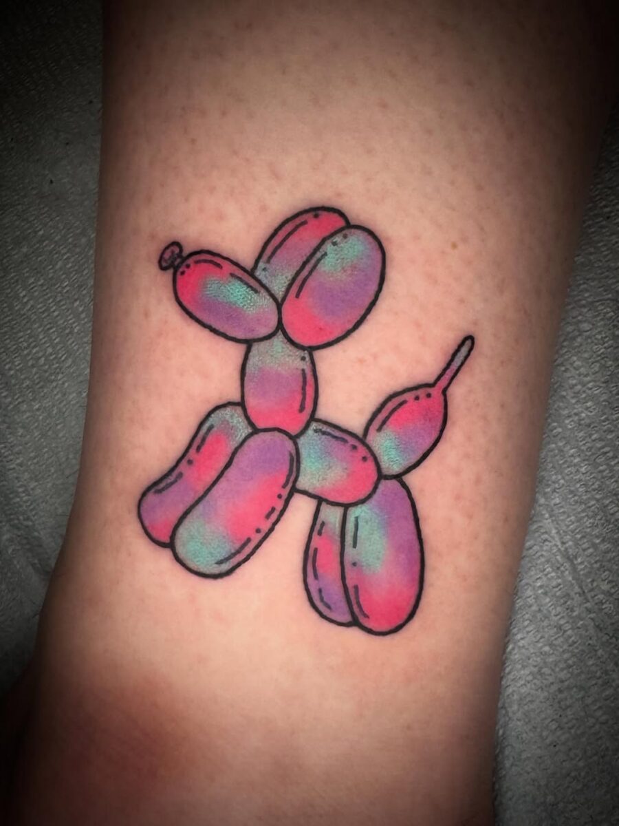 Vibrant Balloon Dog Tattoo in Playful Colors Tattoo on skin