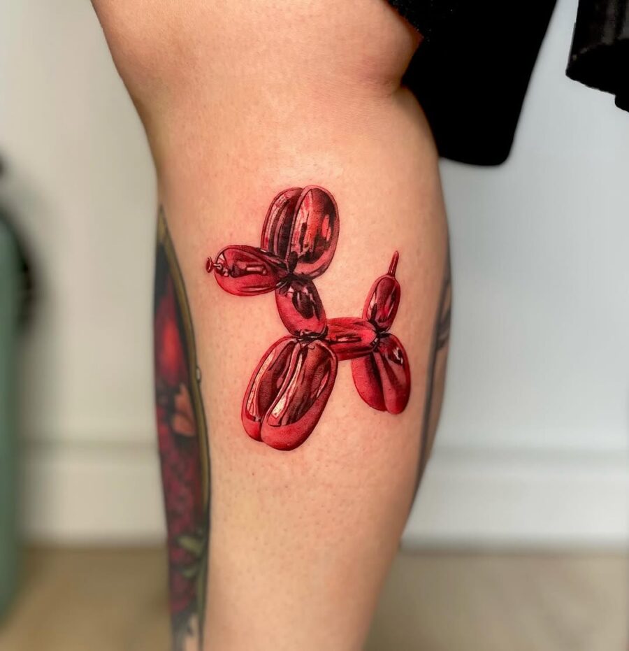 Vibrant Red Balloon Dog Tattoo Design Tattoo on skin