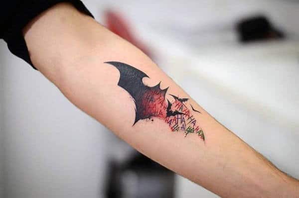Rainbow Hued Batman and Joker Logo Batman Tattoos Tattoo on skin