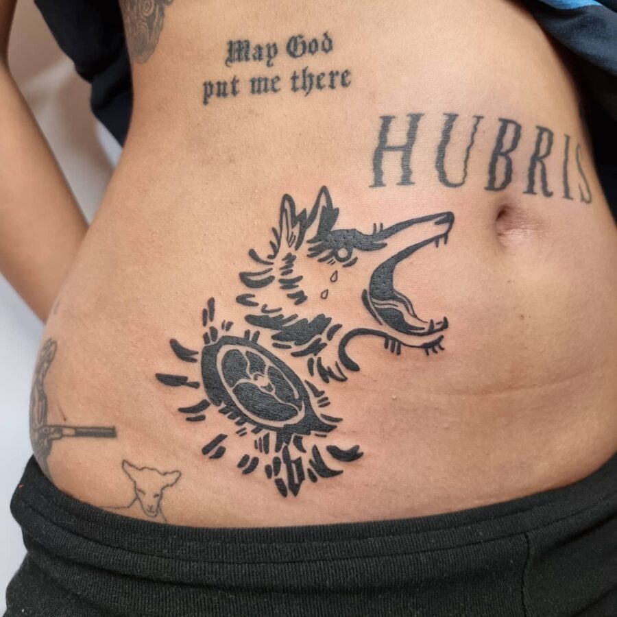 Bold Wolf Design on Belly Celebrates Strength Tattoo on skin