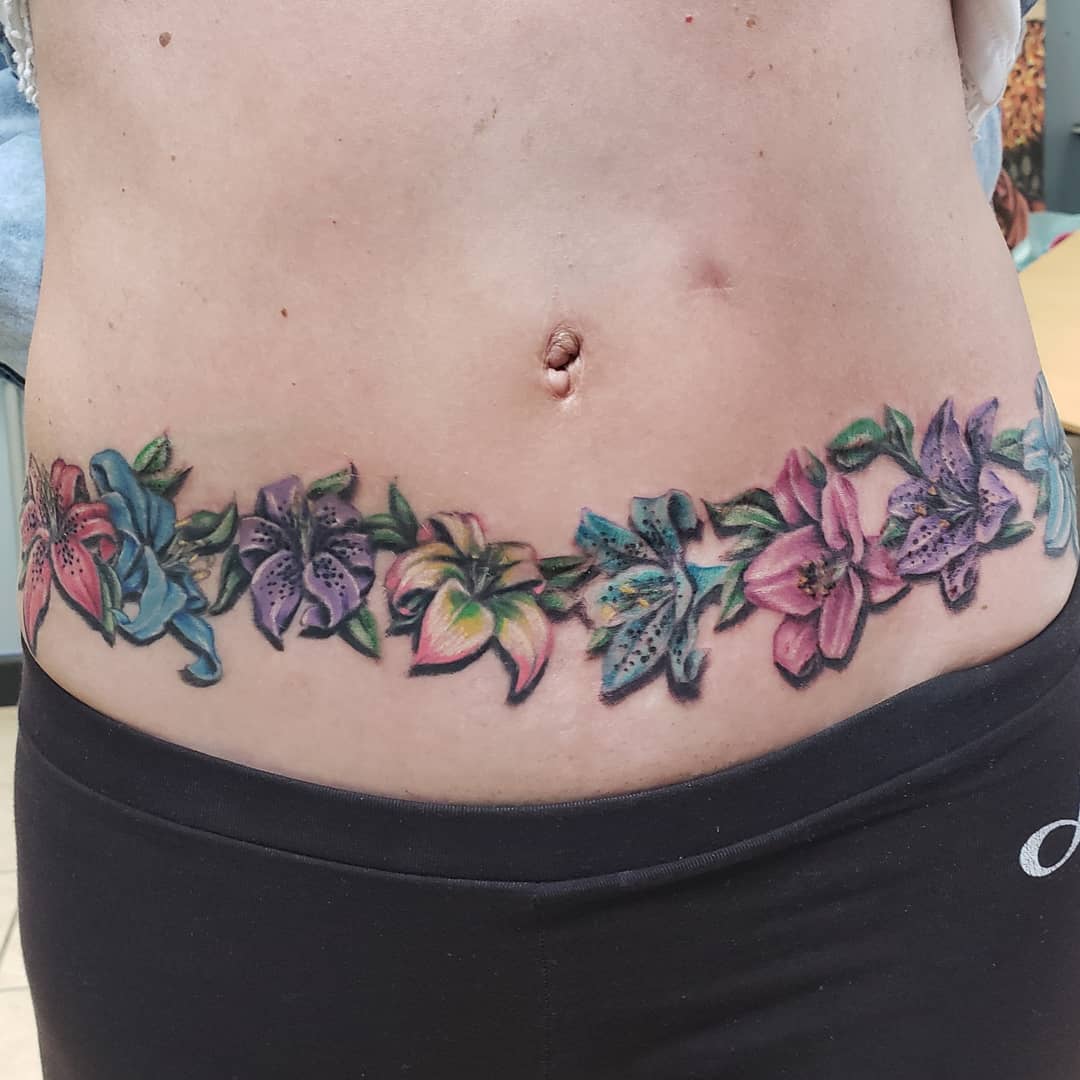 Stunning Floral Belly Tattoo Artistry Tattoo on skin