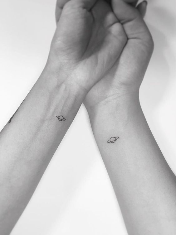 Simple Saturn Inner Wrist Best Friend Tattoos Tattoo on skin