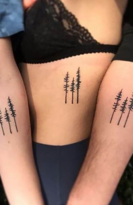 Standing Tall and Strong Together Friend Tattoos Tattoo on skin