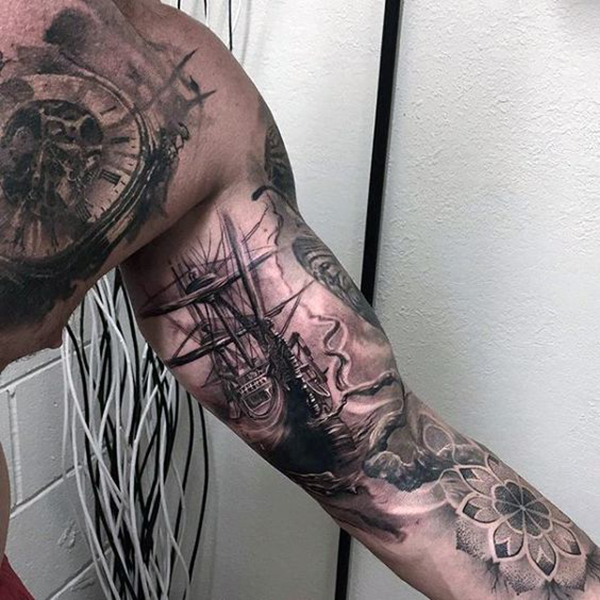 Sailing Ship Caught in a Storm Inner Bicep Tattoo Ideas Tattoo on skin