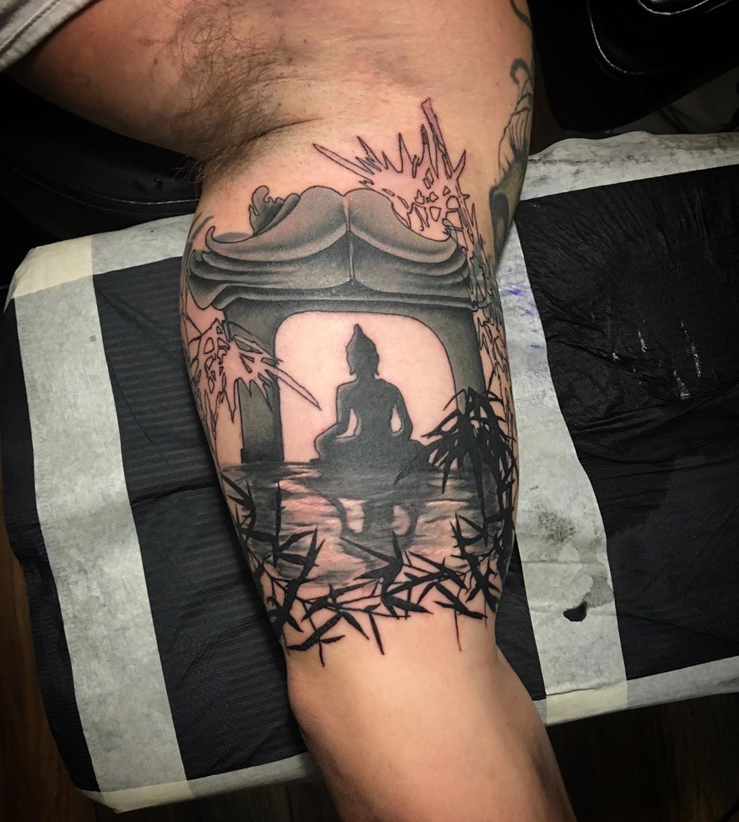 Buddha Figure Under Arch Near Water Inner Bicep Tattoo Ideas Tattoo on skin