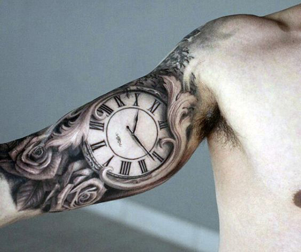 Monochrome Clock with Roses and Leaves Inner Bicep Tattoo Tattoo on skin