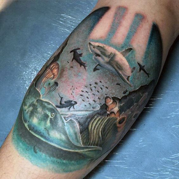 Reef Scene with Sharks and Fish Inner Bicep Tattoo Ideas Tattoo on skin