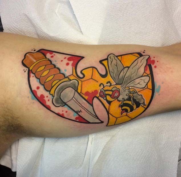 Wu-Tang Clan Logo with Hornet and Blade Inner Bicep Tattoos Tattoo on skin