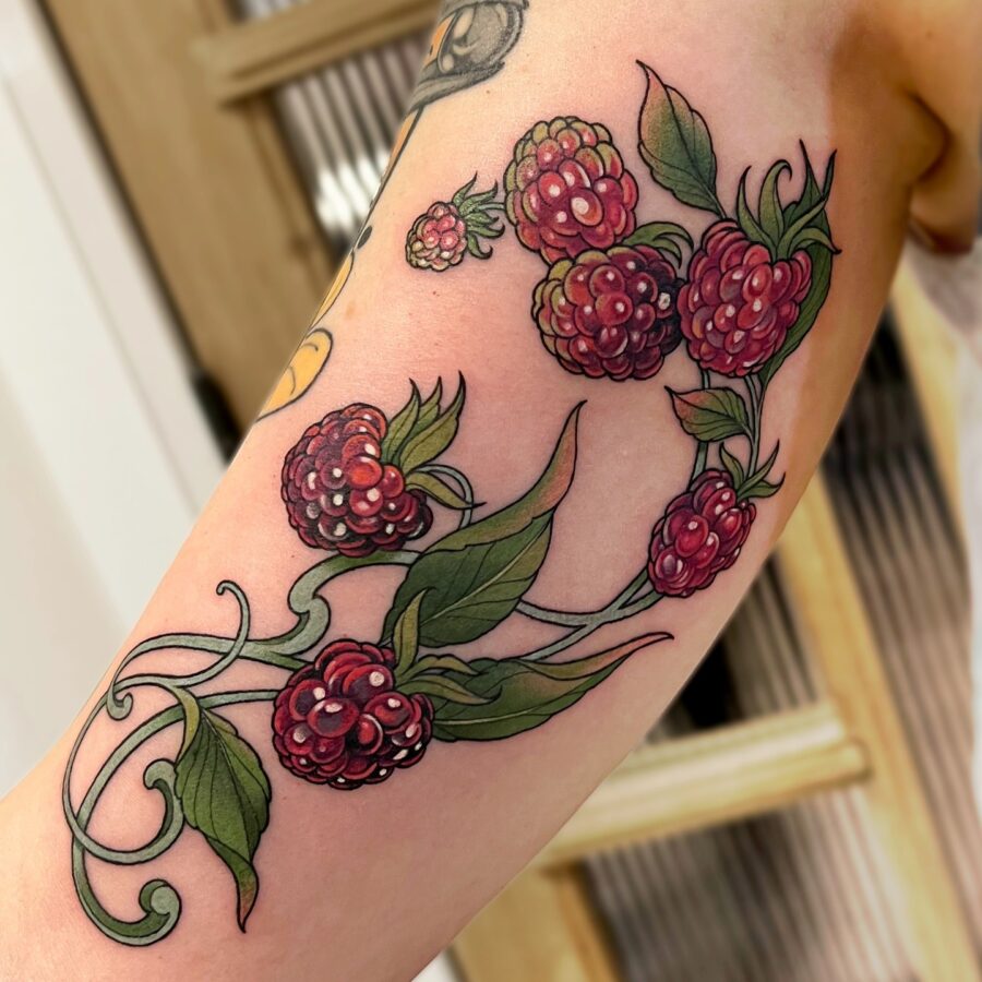 A vibrant berry tattoo for arm expression Tattoo on skin