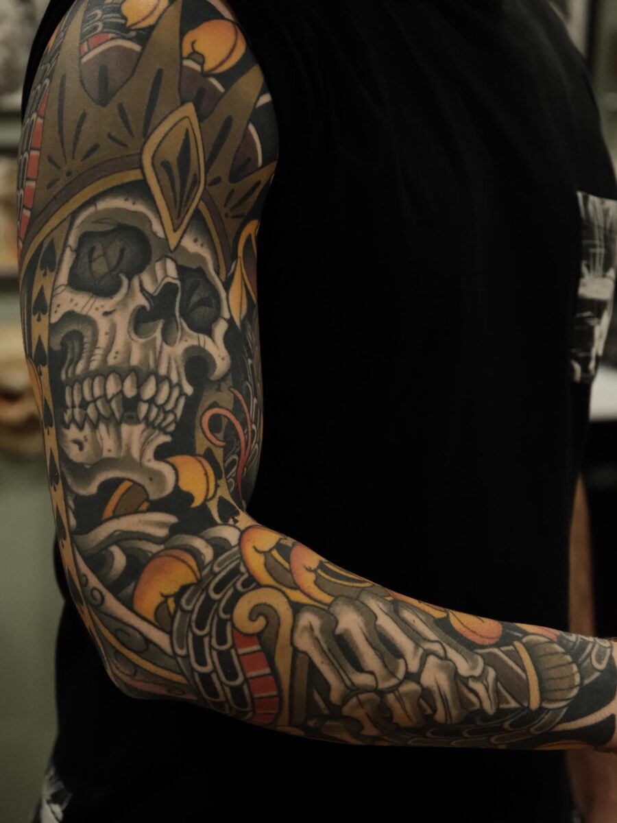 Eye-catching skeleton-themed biceps tattoo design Tattoo on skin