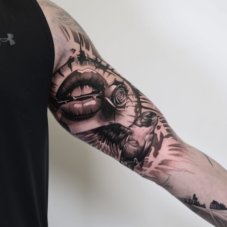 Striking blend of lips, bird, and rose tattoo Tattoo on skin