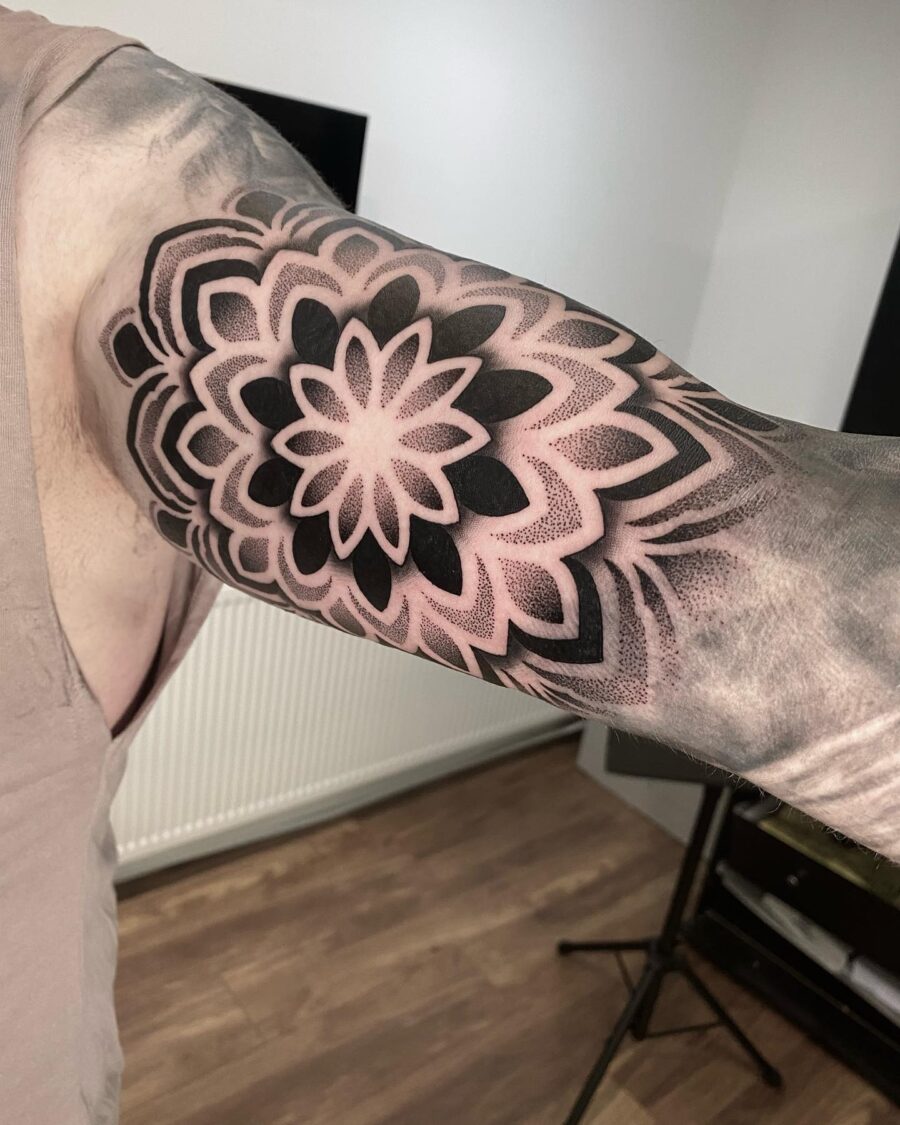 Stunning Flower-Inspired Biceps Tattoo Design Tattoo on skin