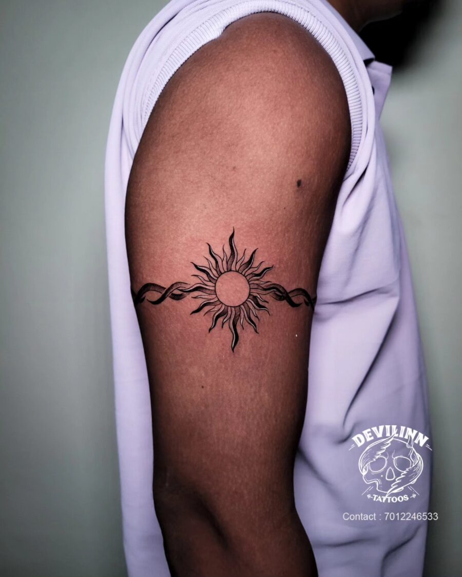 Stylish sun and infinity bicep tattoo biceps tattoos