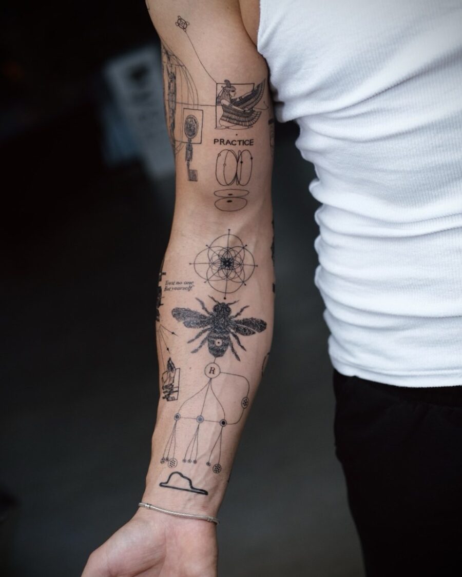 Unique bicep tattoo with geometric and bee art Tattoo on skin