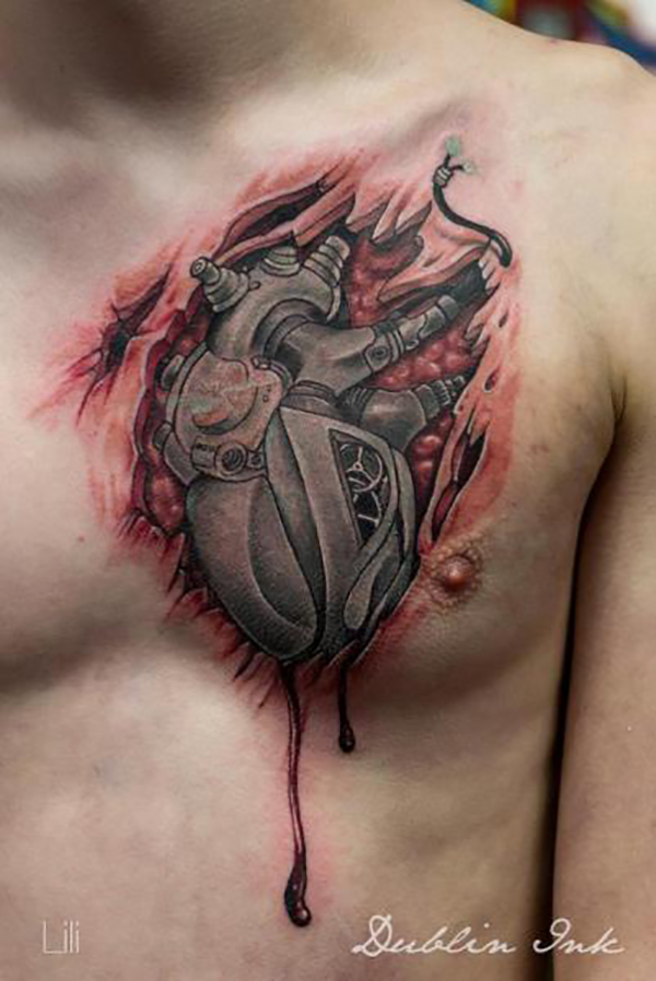 Bleeding Heart Biomechanical Chest Tattoo Tattoo on skin