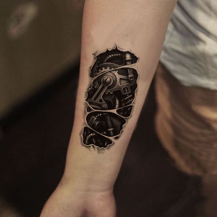 Dark Torn Skin Biomechanical Forearm Tattoo Tattoo on skin