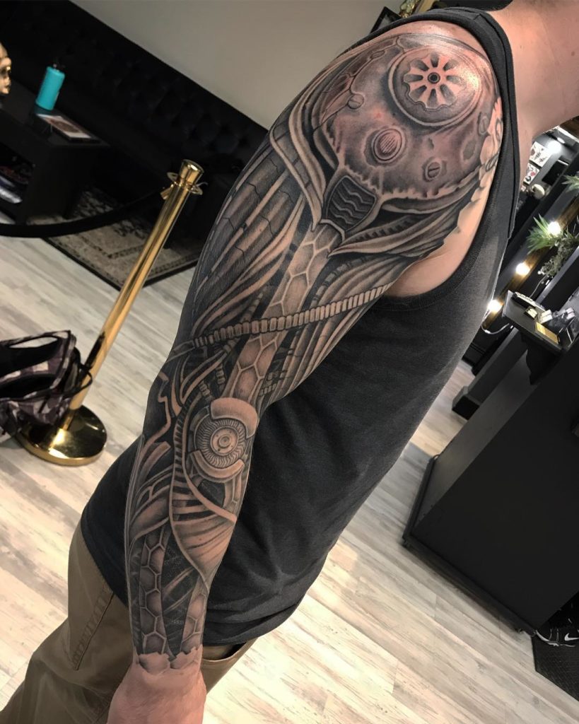 Grayscale Biomechanical Full Arm Sleeve Tattoo Tattoo on skin