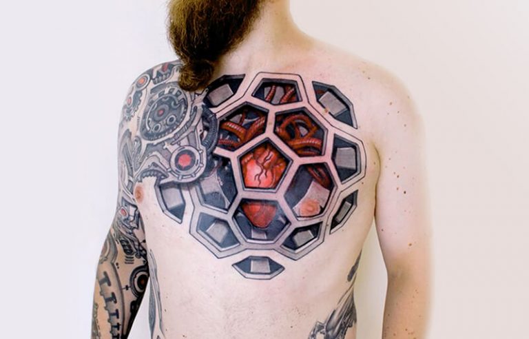 Honeycomb Style Biomechanical Tattoo on Chest Tattoo on skin