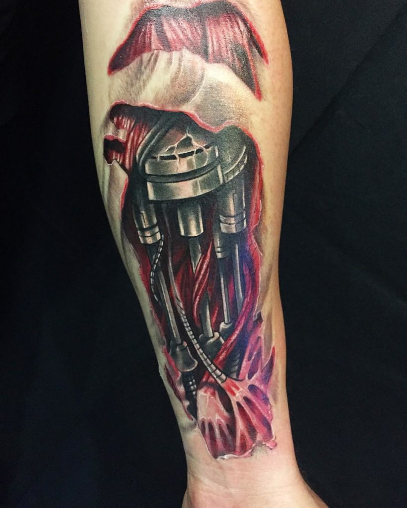 Wires and Tendons Biomechanical Arm Tattoo Tattoo on skin