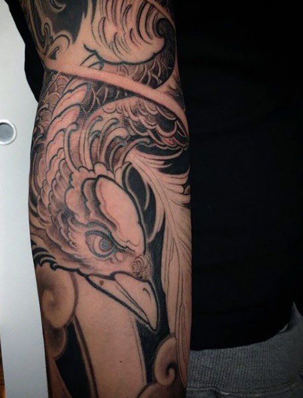 Black and White Wrap Around Phoenix Tattoo Tattoo on skin
