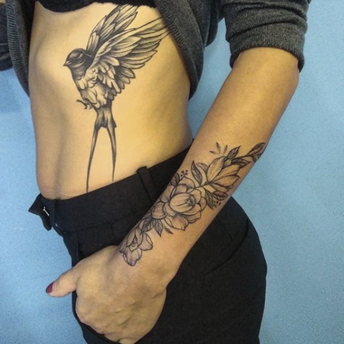 Elegant Grayscale Swallow Tattoo on Ribs Tattoo on skin