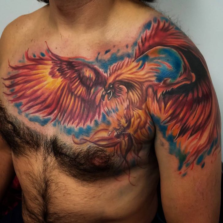 Rising Red Phoenix with Blue Accents Tattoo Tattoo on skin